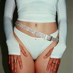 Ballet Bolero Set in cloud white featuring a matching shrug, tube top and thong. Also featuring a white glitter belt.