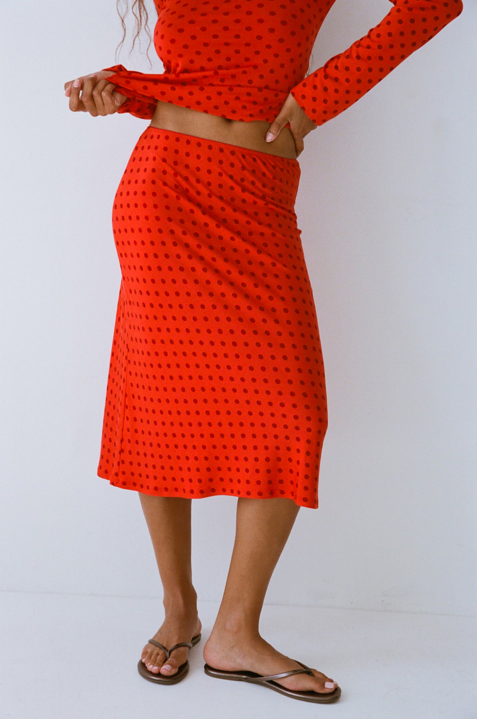 BIAS MIDI SLIP SKIRT IN CHILI PEPPER